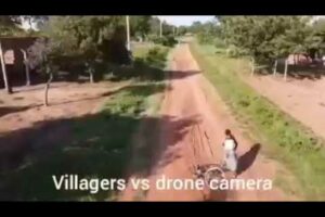 hilarious as villagers run away from a drone camera.